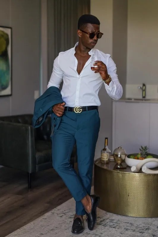 White shirt with teal colour pants