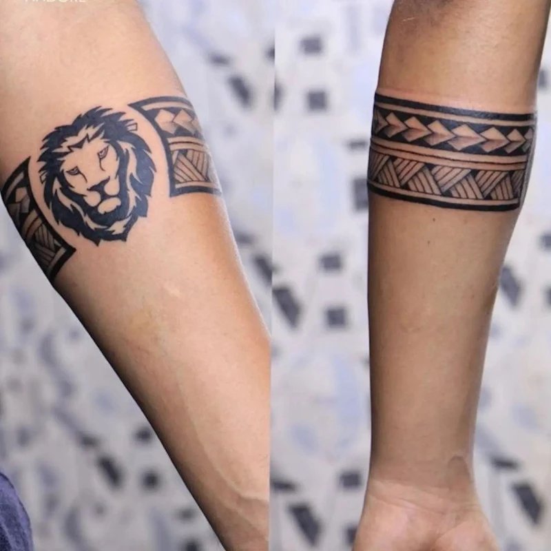 Lion face armband tattoo on forearms 