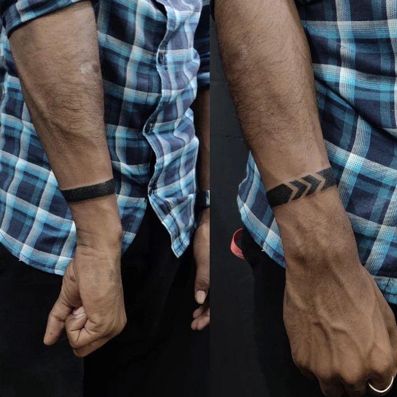 Thin wrist armband tattoo design