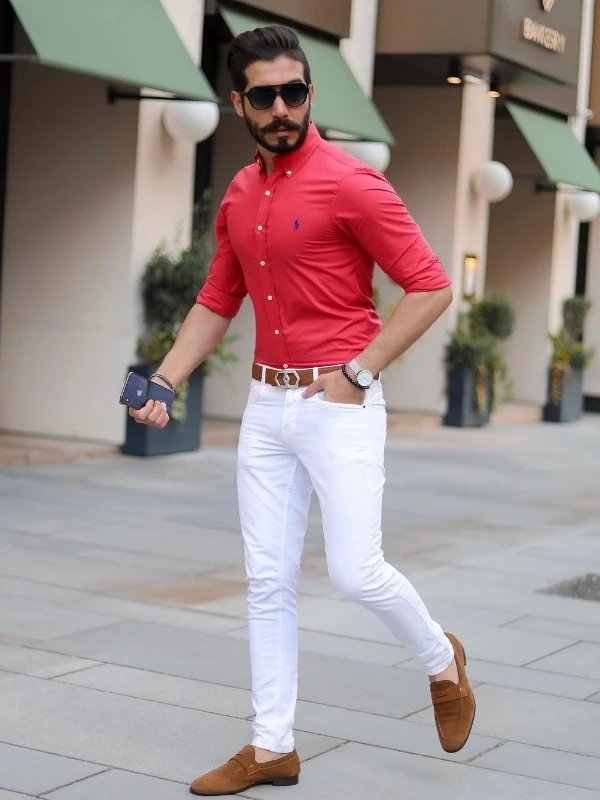 A Man in Red Shirt and White Pants Standing on the Street while Holding a  Black Camera  Free Stock Photo