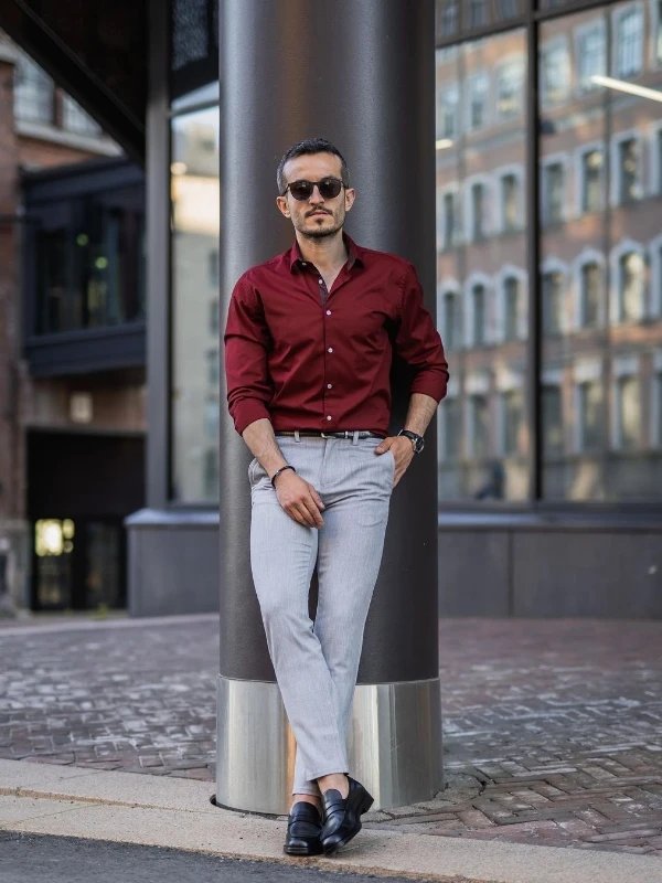 Red shirt with grey trousers