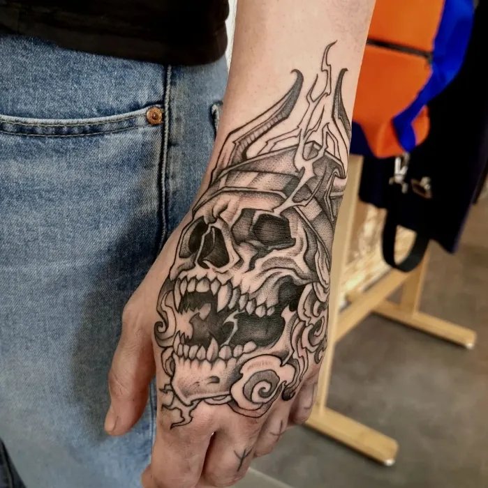 Skeleton on knuckle tattoo men