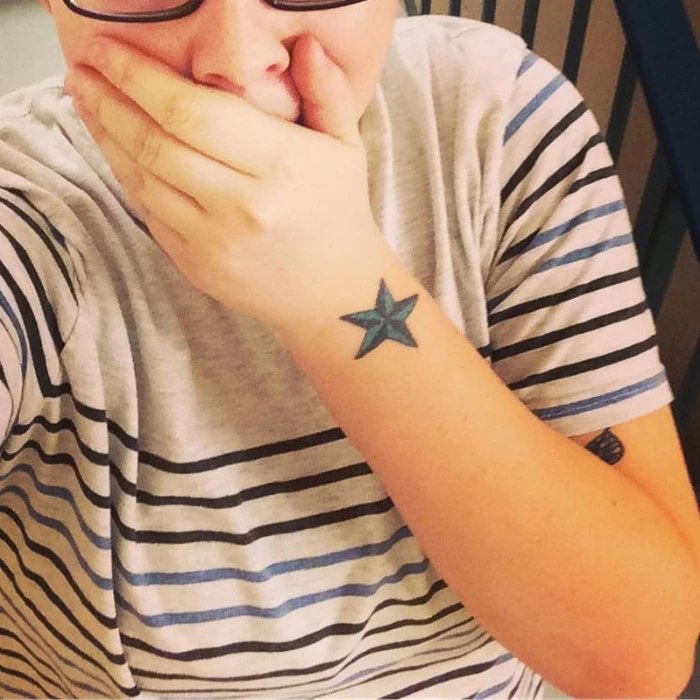 Small Nautical Star Tattoo on Hand