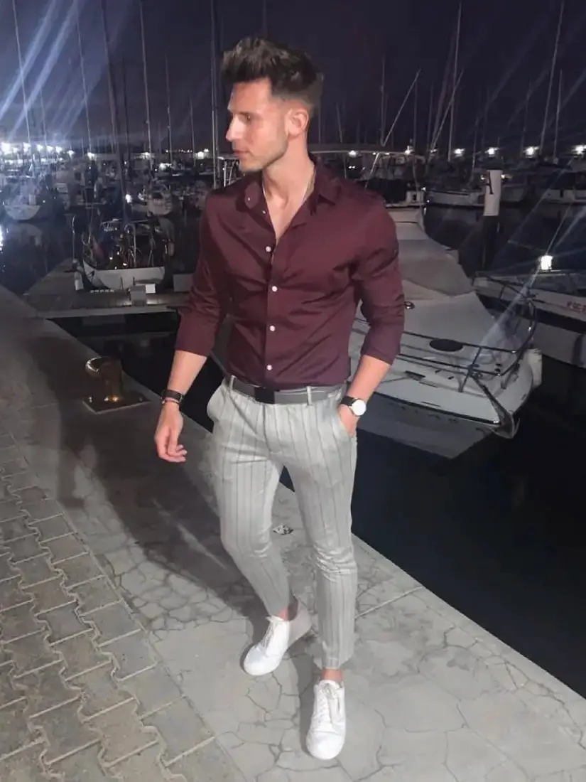 Maroon shirt with grey trousers 