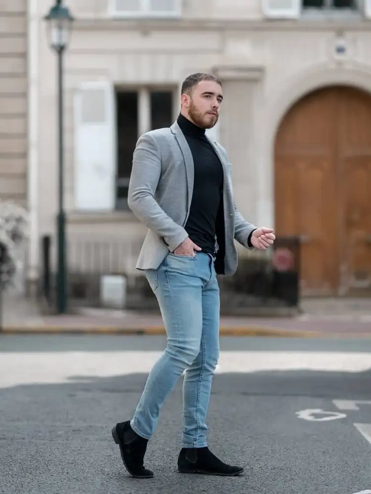 Black highneck blue jeans with grey blazer outfit