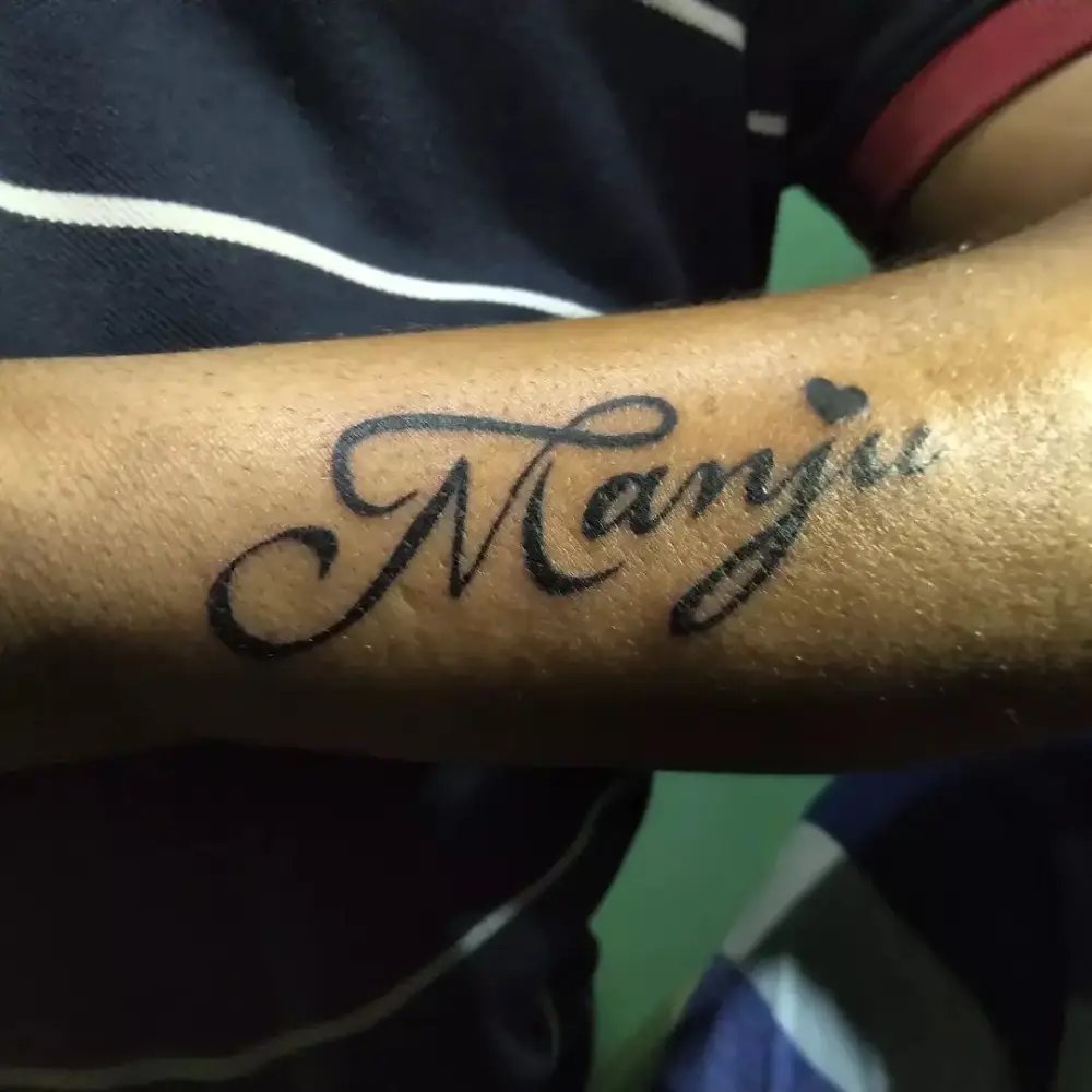 Side Hand Name Tattoo Designs for Men