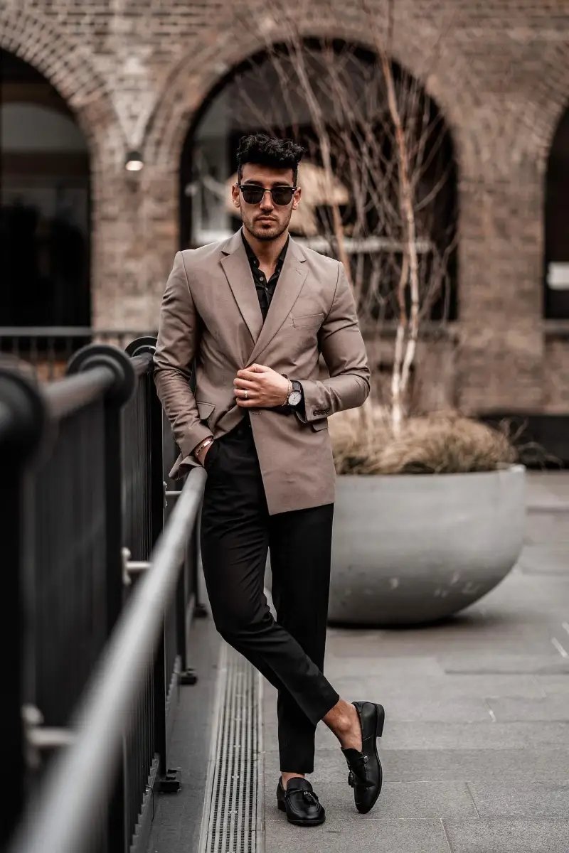 Premium Photo | Asian woman in brown beige jacket blazer blue top skirt on  textured black white wall tall flower