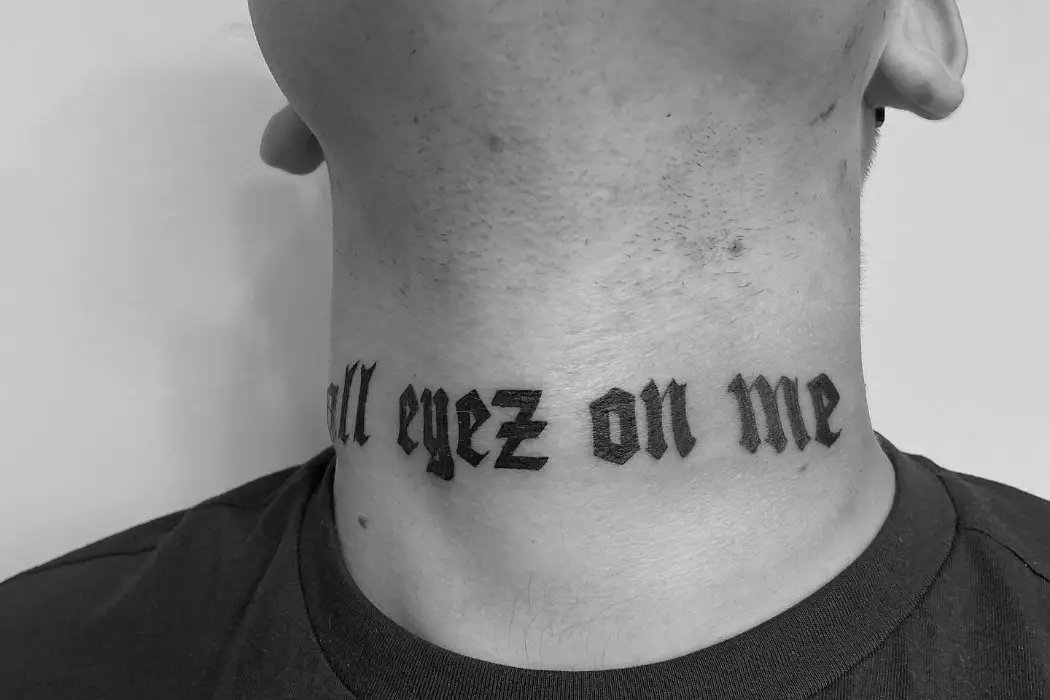 All eyes on me written tattoo on neck men