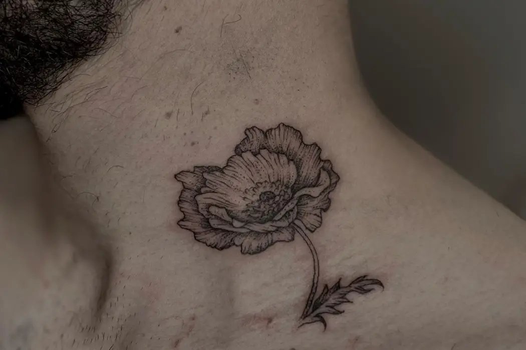 Flower tattoo design on neck men