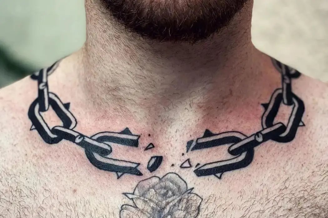 Chain break tattoo idea on neck