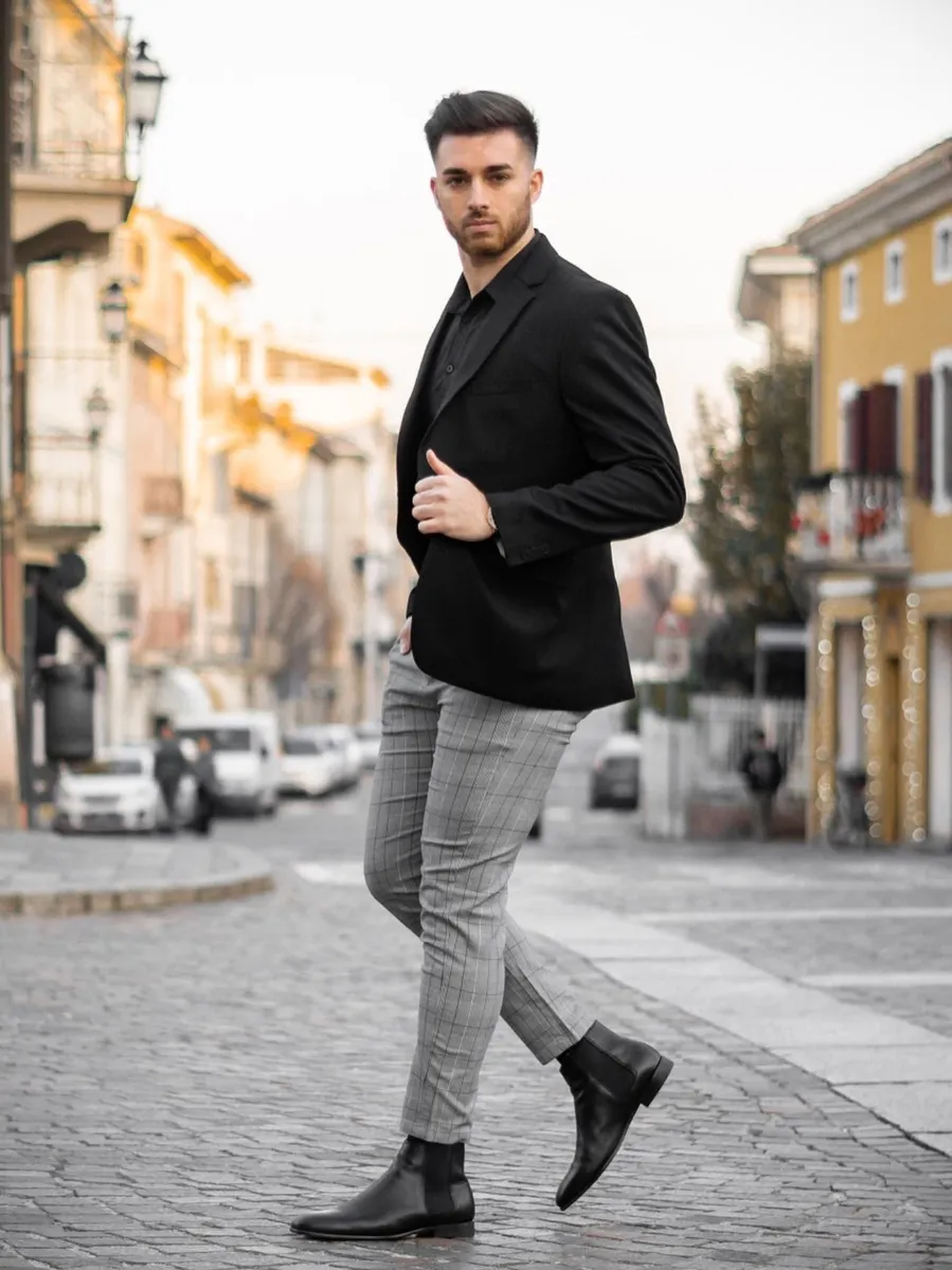 Black Blazer with Black Shirt and Grey Pants

