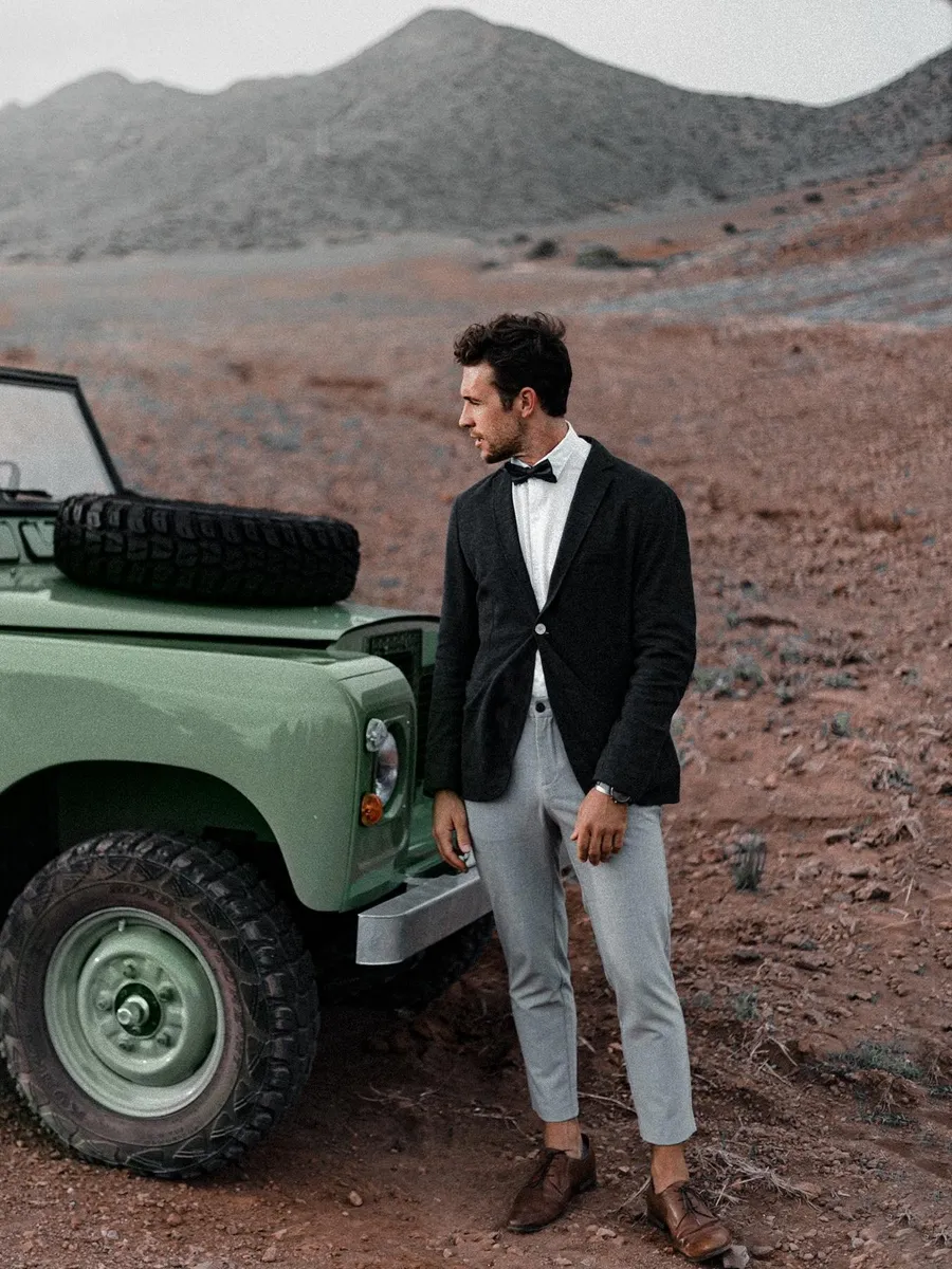 White shirt, grey pants, and black blazer combination

