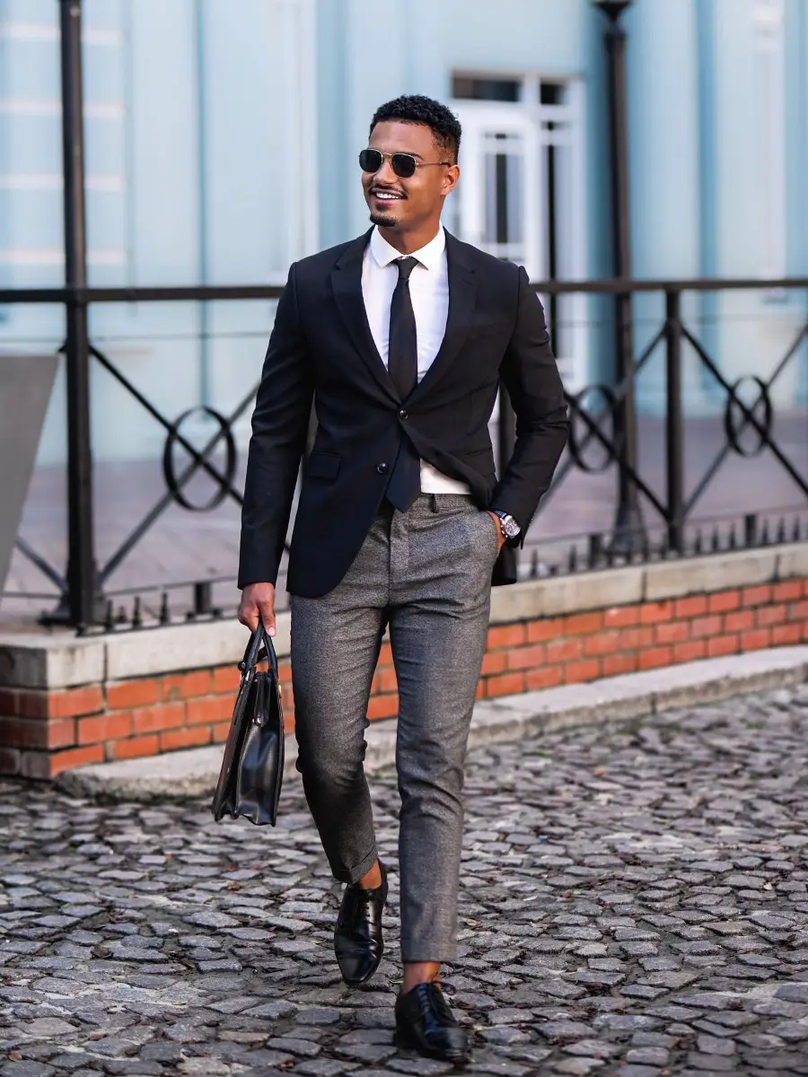 White shirt, gray pants, and black blazer combination