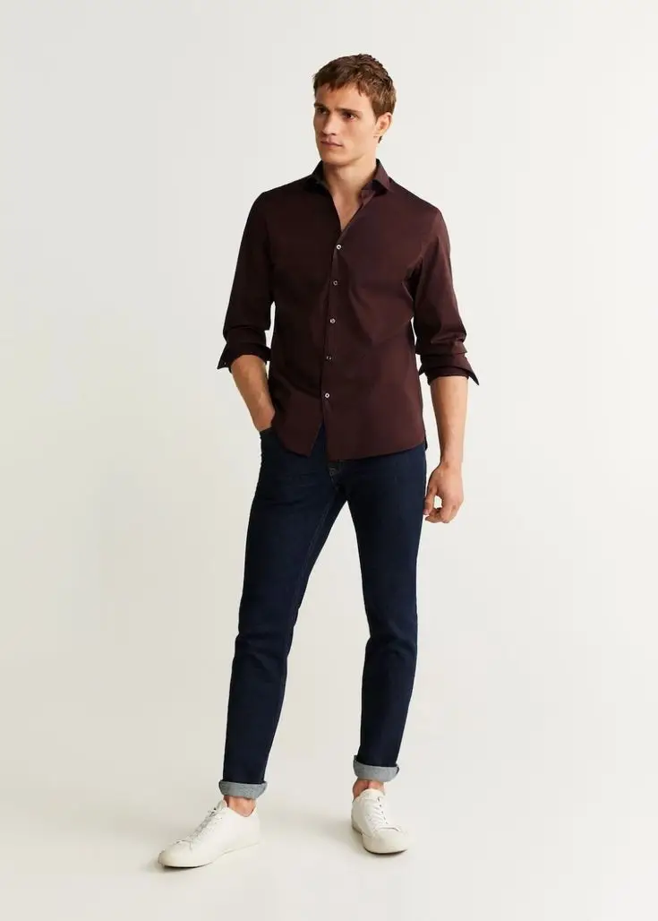 brown shirt with navy blue pants