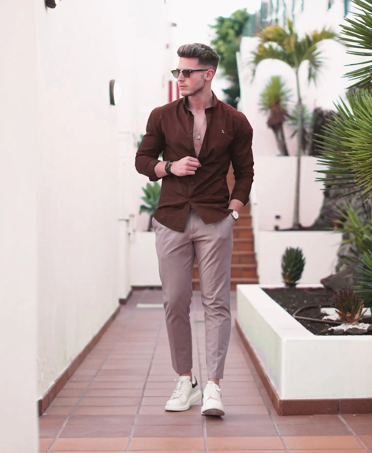 brown shirt with beige pants