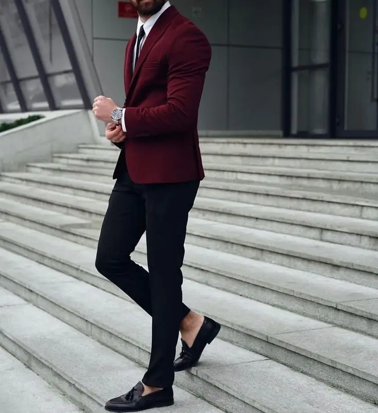 maroon blazer with white and black