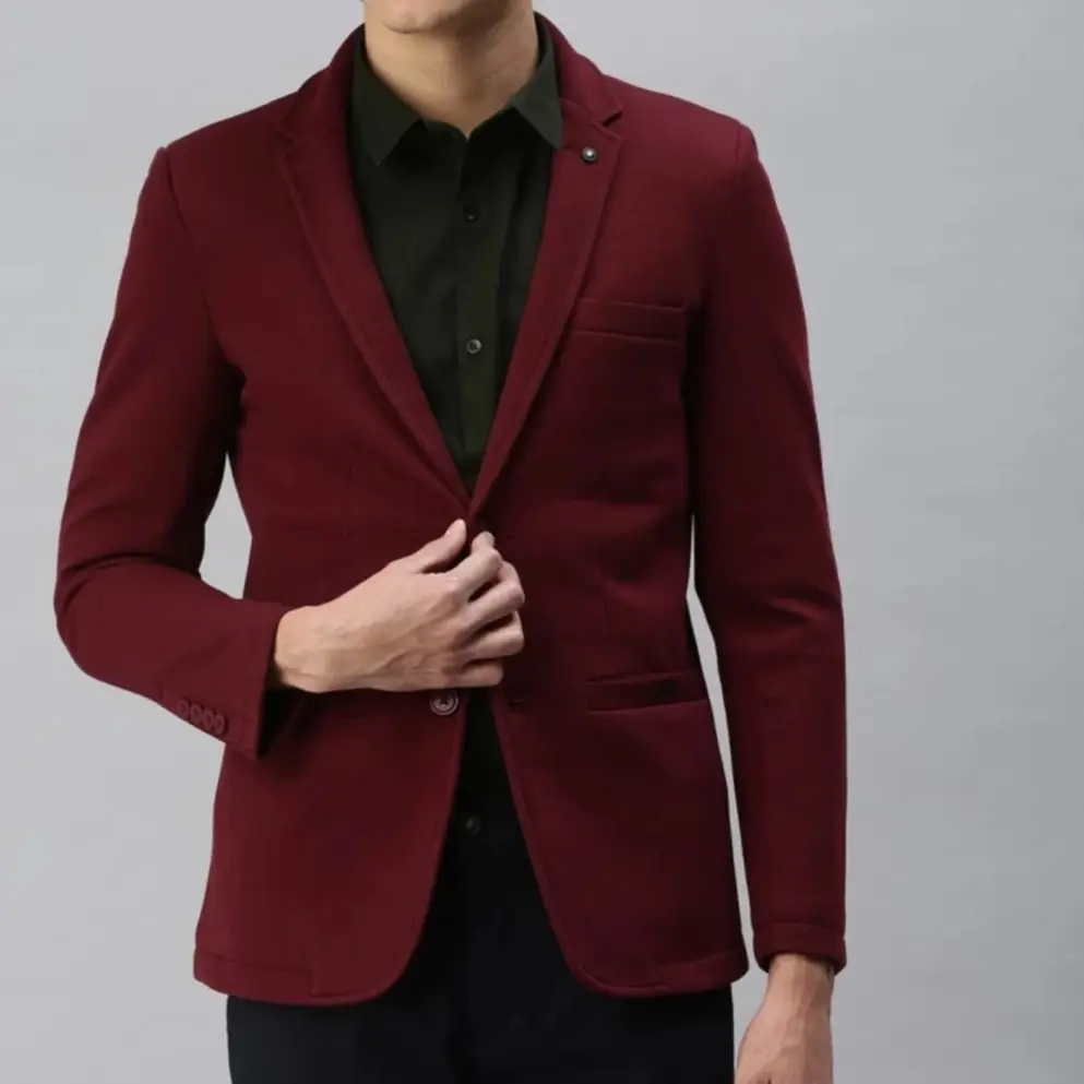 Maroon blazer with black shirt and black pants