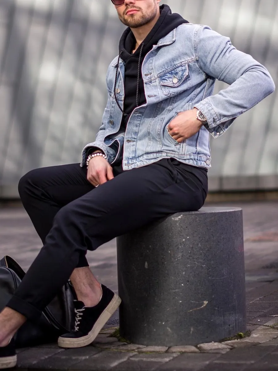 Blue denim jacket with black upper & bottom wear