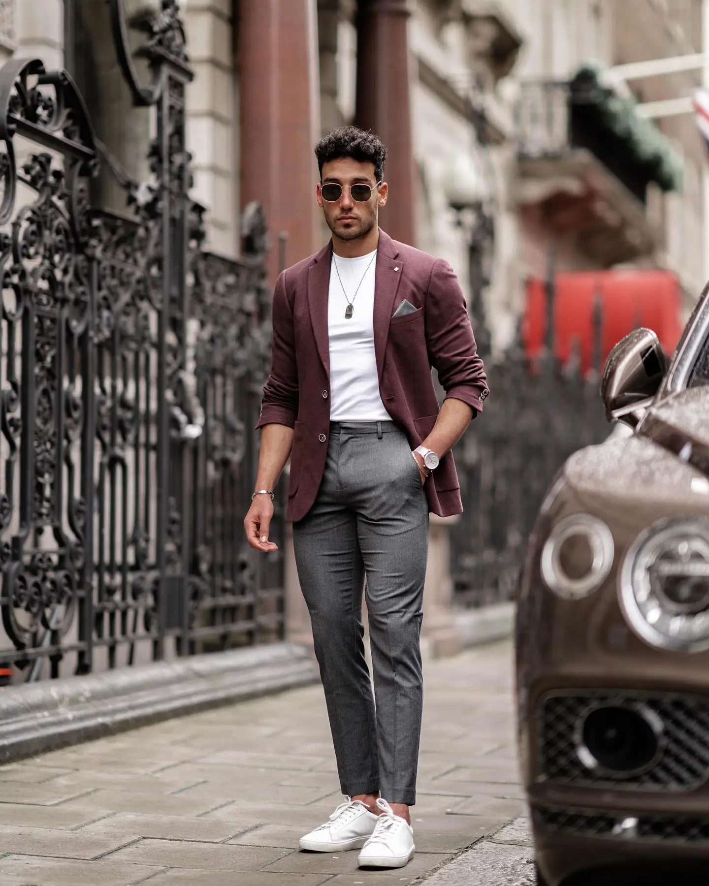 Maroon blazer with white shirt and dark brown pants