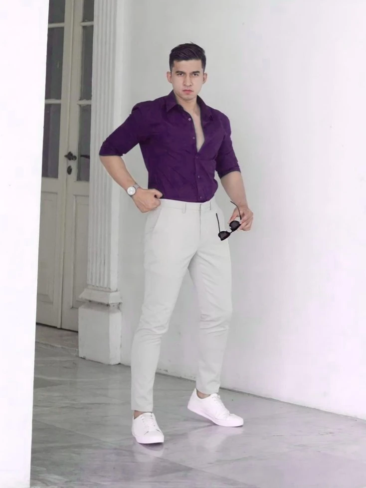 Purple shirt white pants