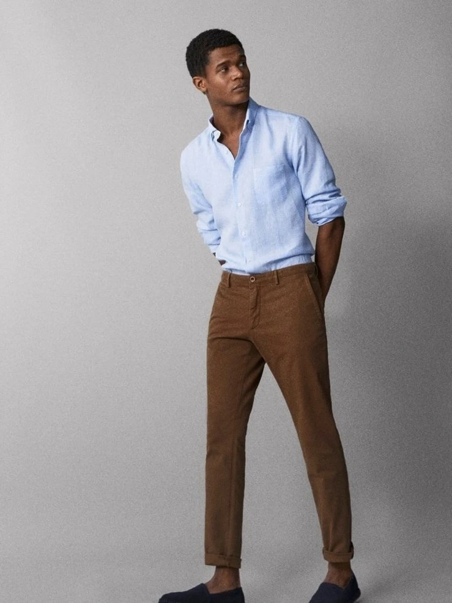 Brown Pant light blue shirt