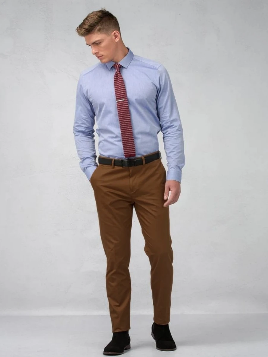 Dressing Blue Shirt Brown Pants Young Stock Photo 150029225  Shutterstock