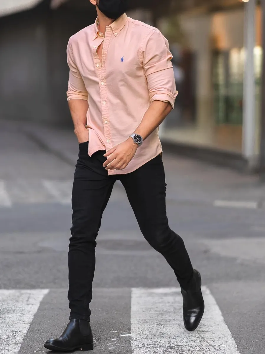 Peach color shirt with black pants