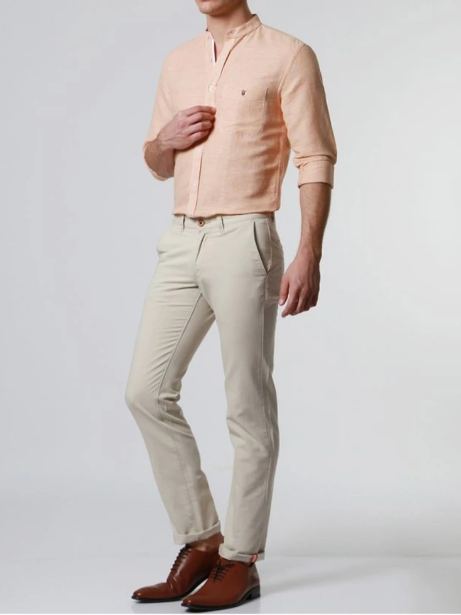 Peach color shirt with cream pants