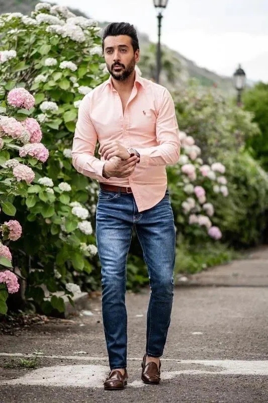 Peach color shirt with blue jeans pants