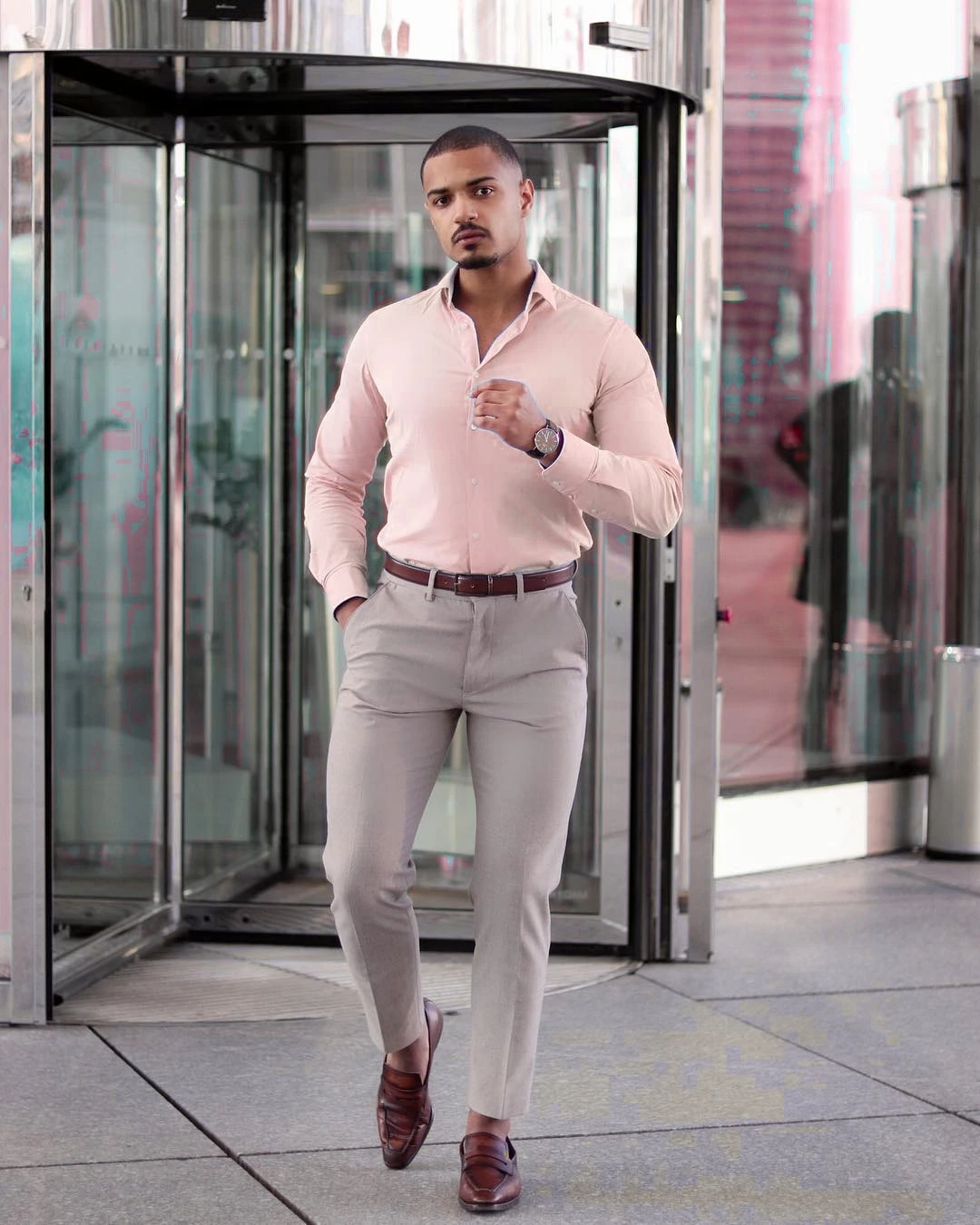 Peach color shirt with light grey pants