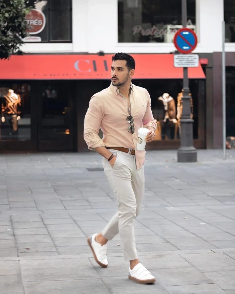 Peach color shirt with light grey pants