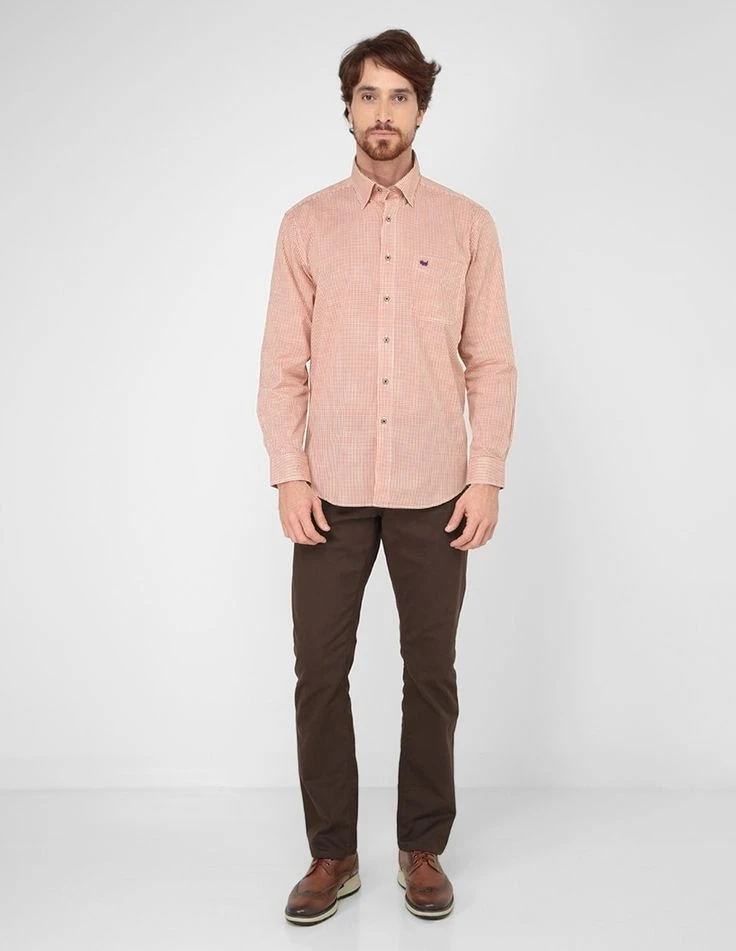 Peach color shirt with brown pants