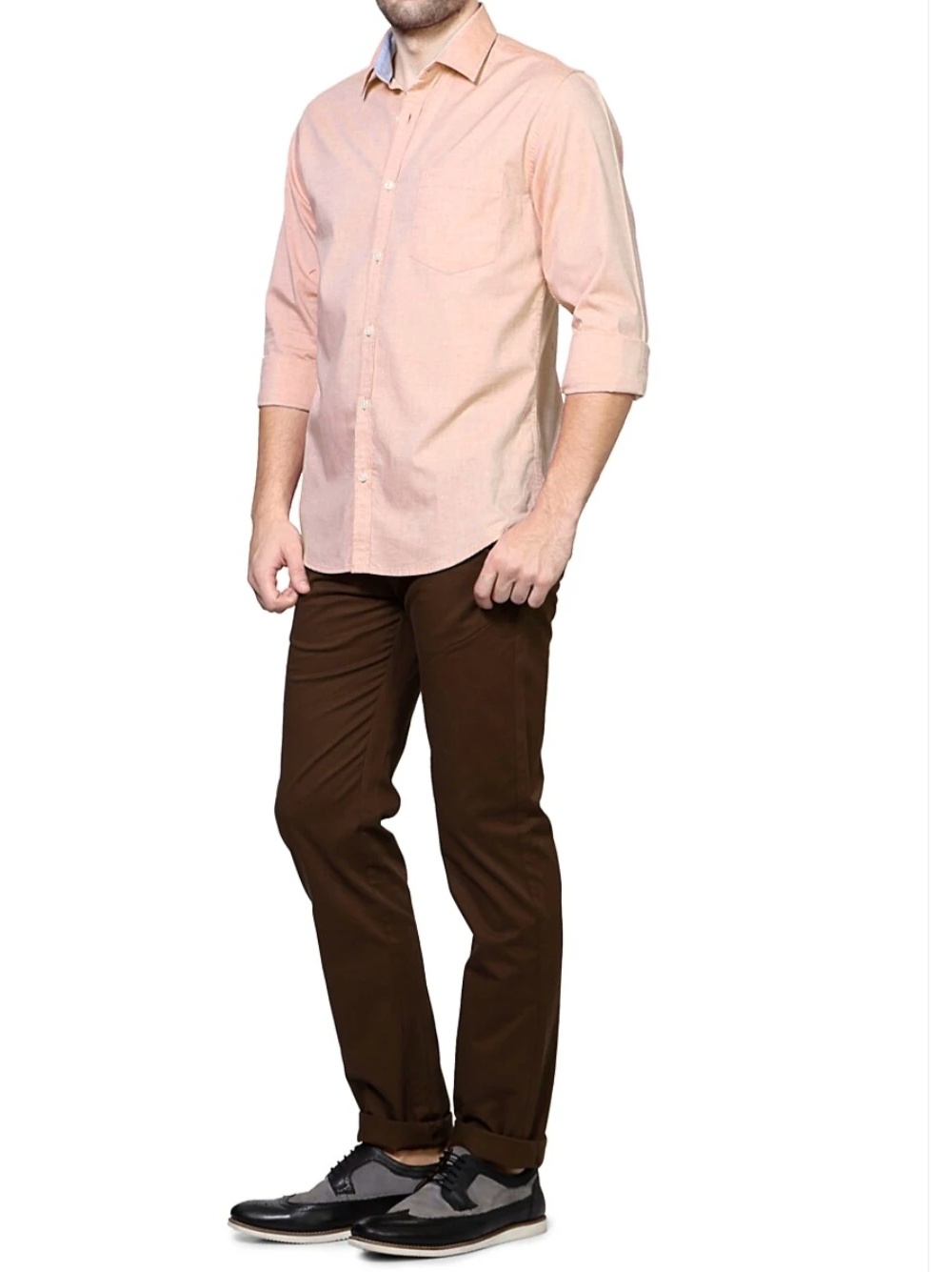 Peach color shirt with brown pants