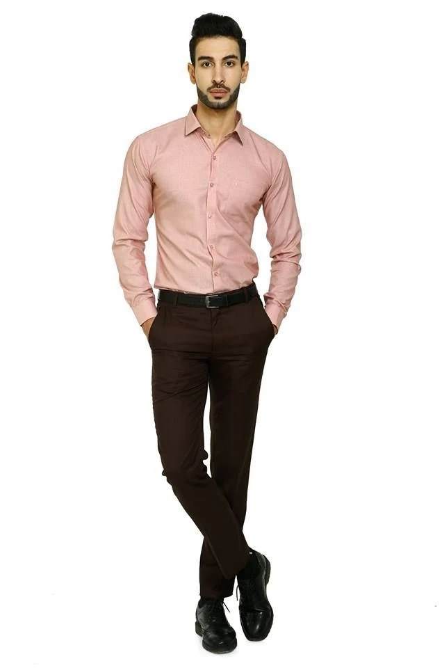 Peach color shirt with brown pants