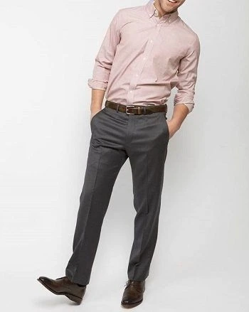 Peach color shirt with dark grey pants