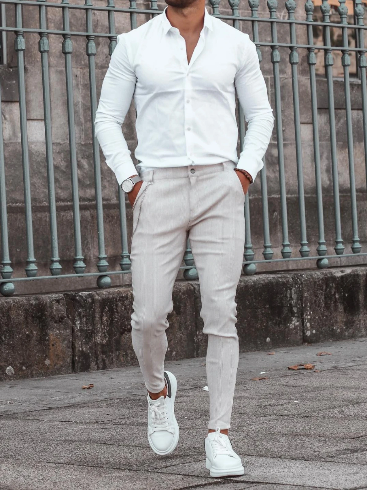 White shirt light grey pants