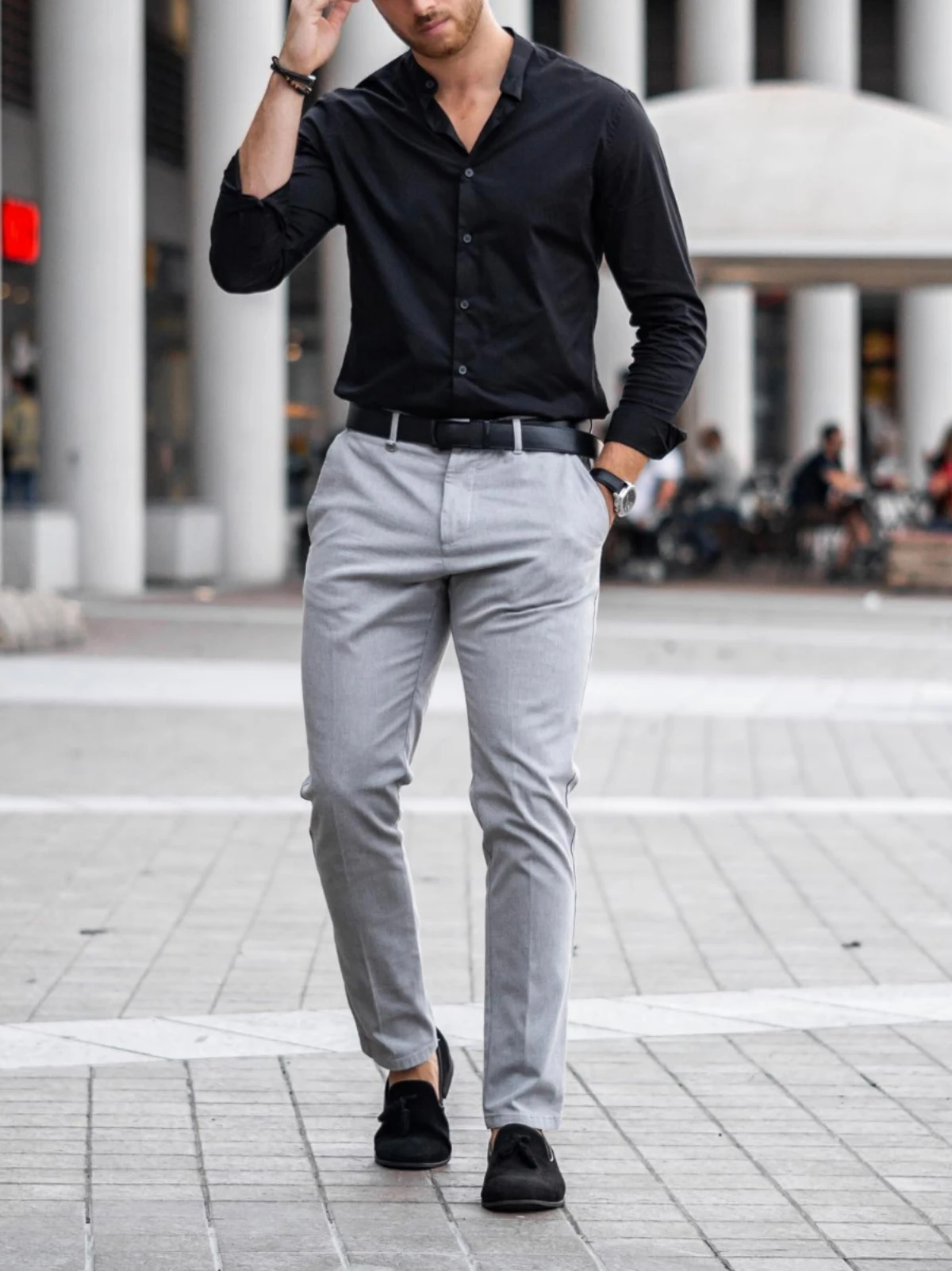 Black shirt with light grey pants