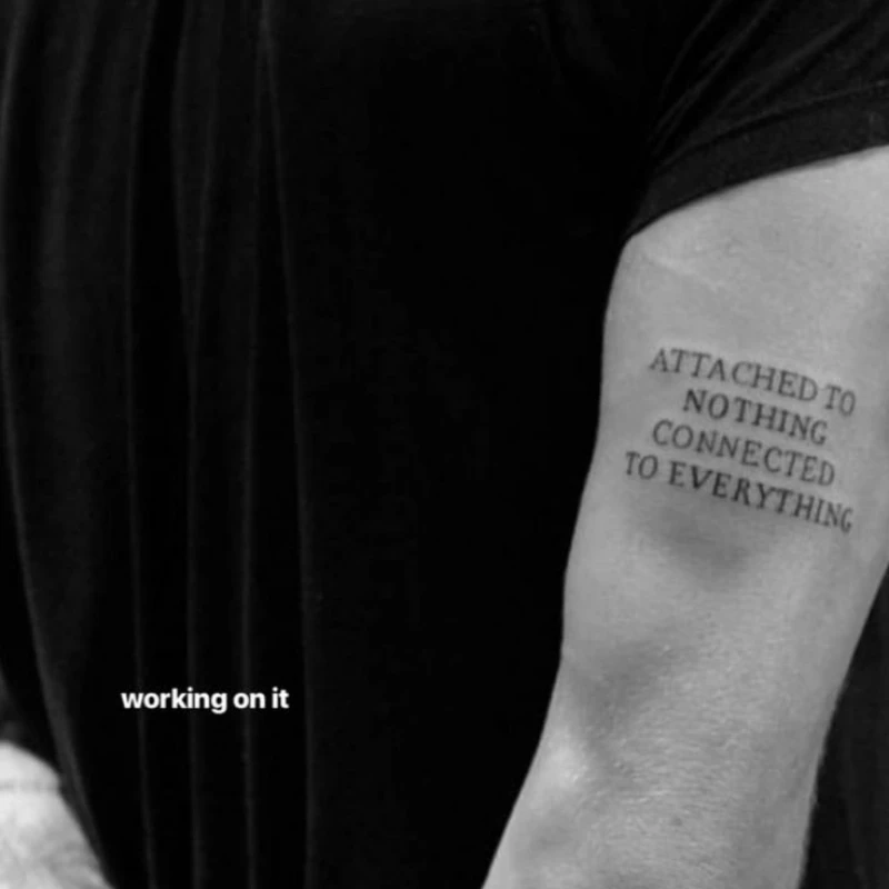Quotes tattoo on hand - Attached to nothing connected to everything 