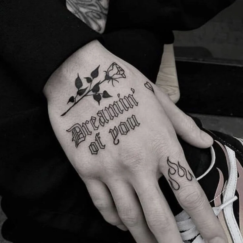 Text tattoo on hand men - dream of you