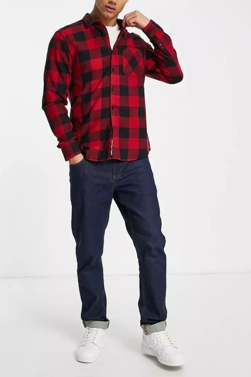 Red black check shirt with dark blue jeans