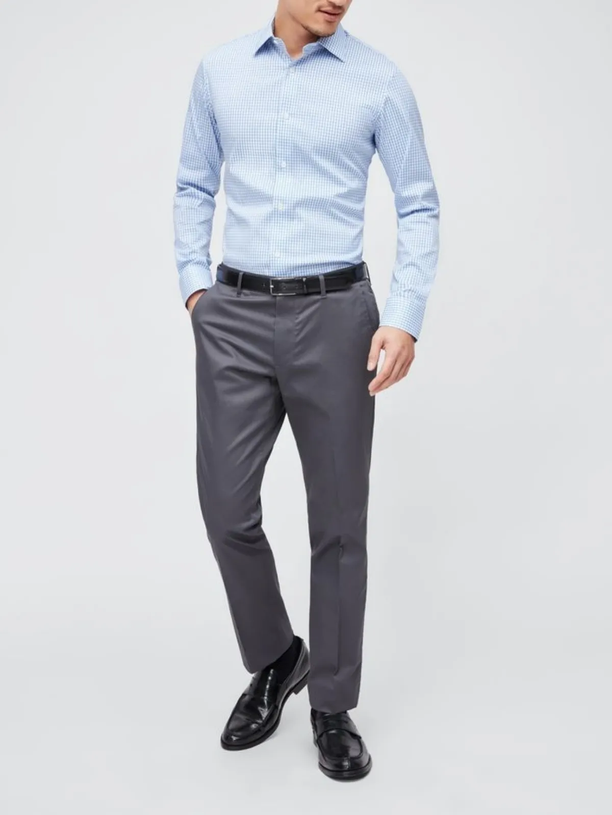 Light blue shirt with dark grey pants