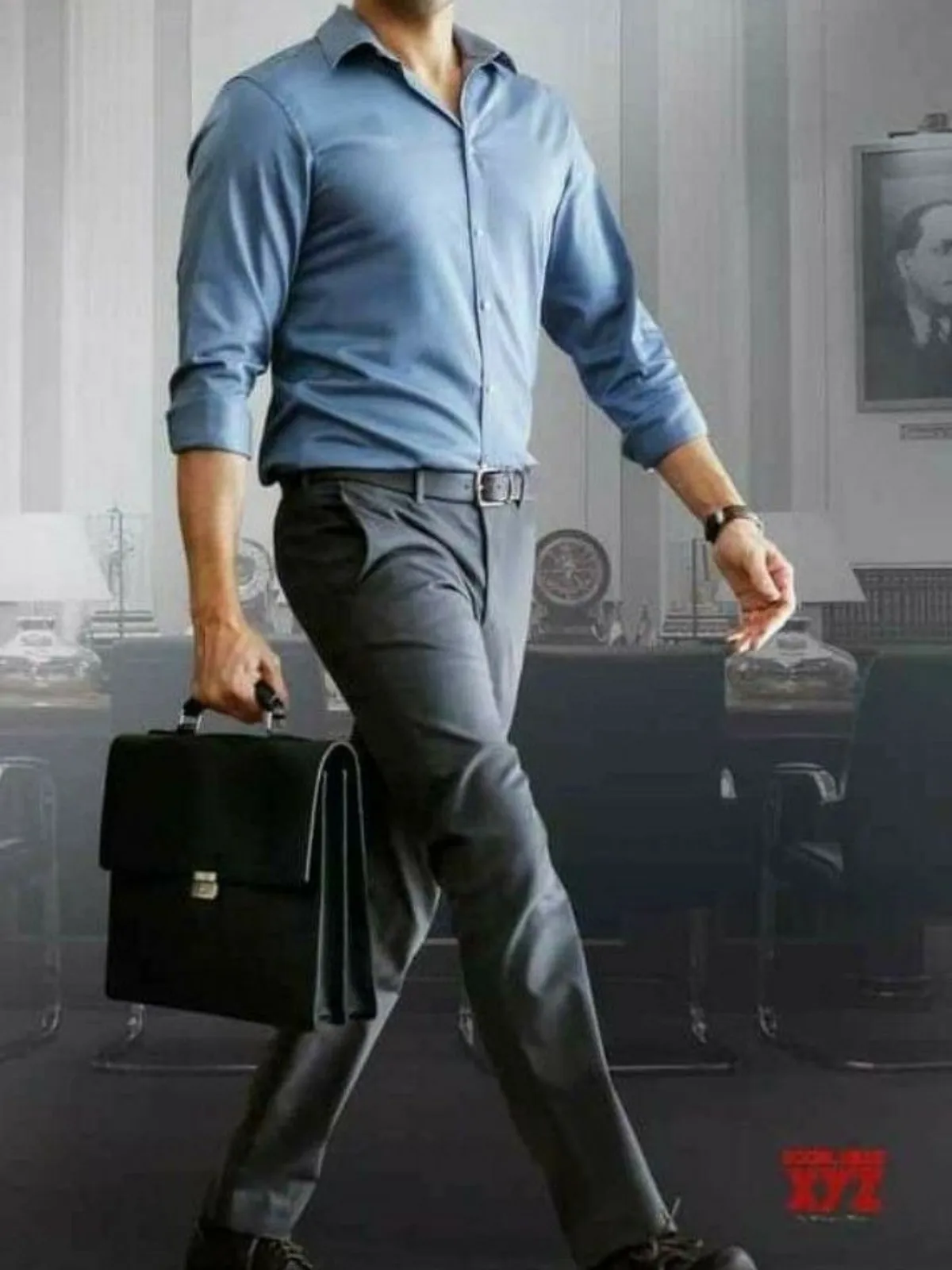 Blue shirt with dark grey pants